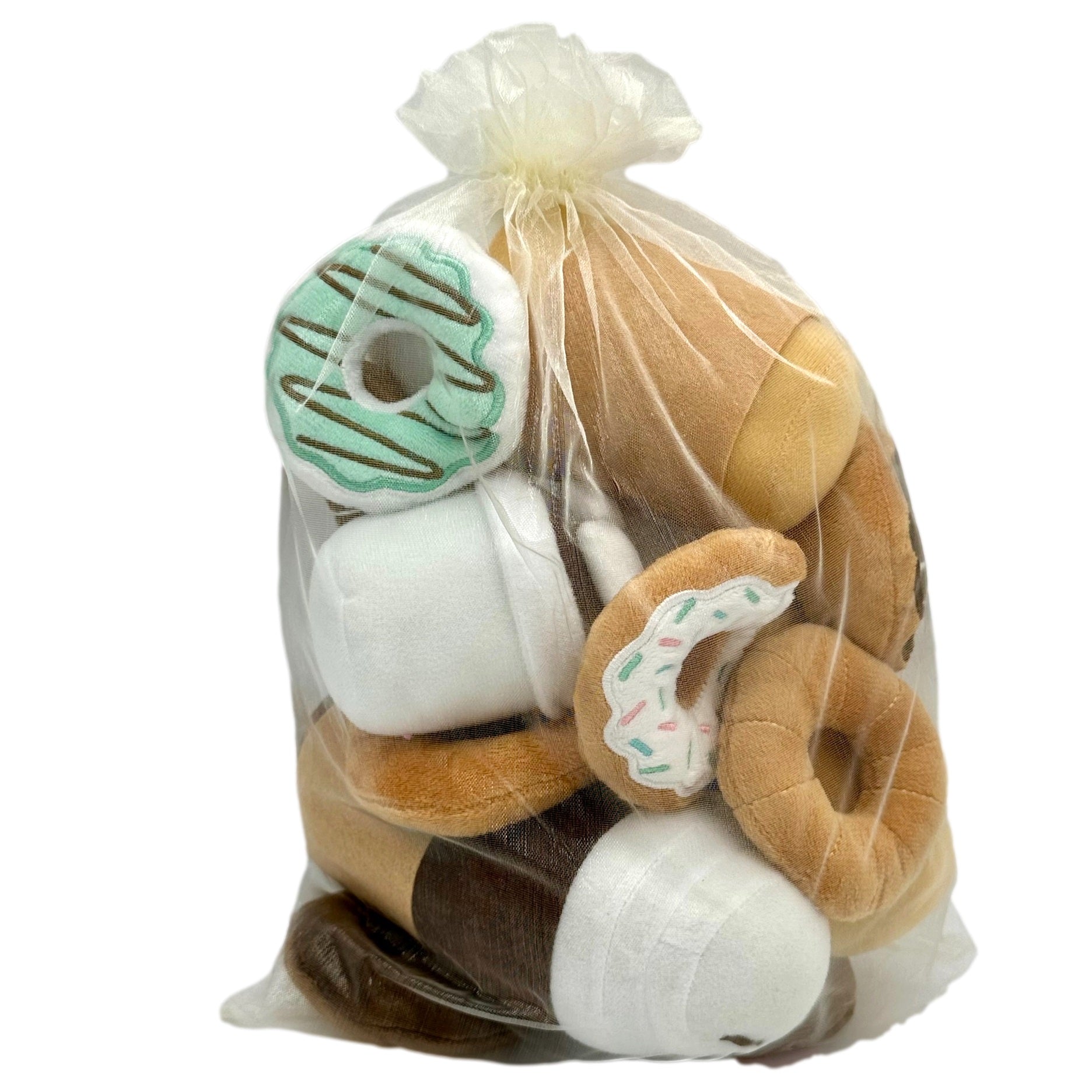 A clear bag filled with assorted plush donuts and cups.